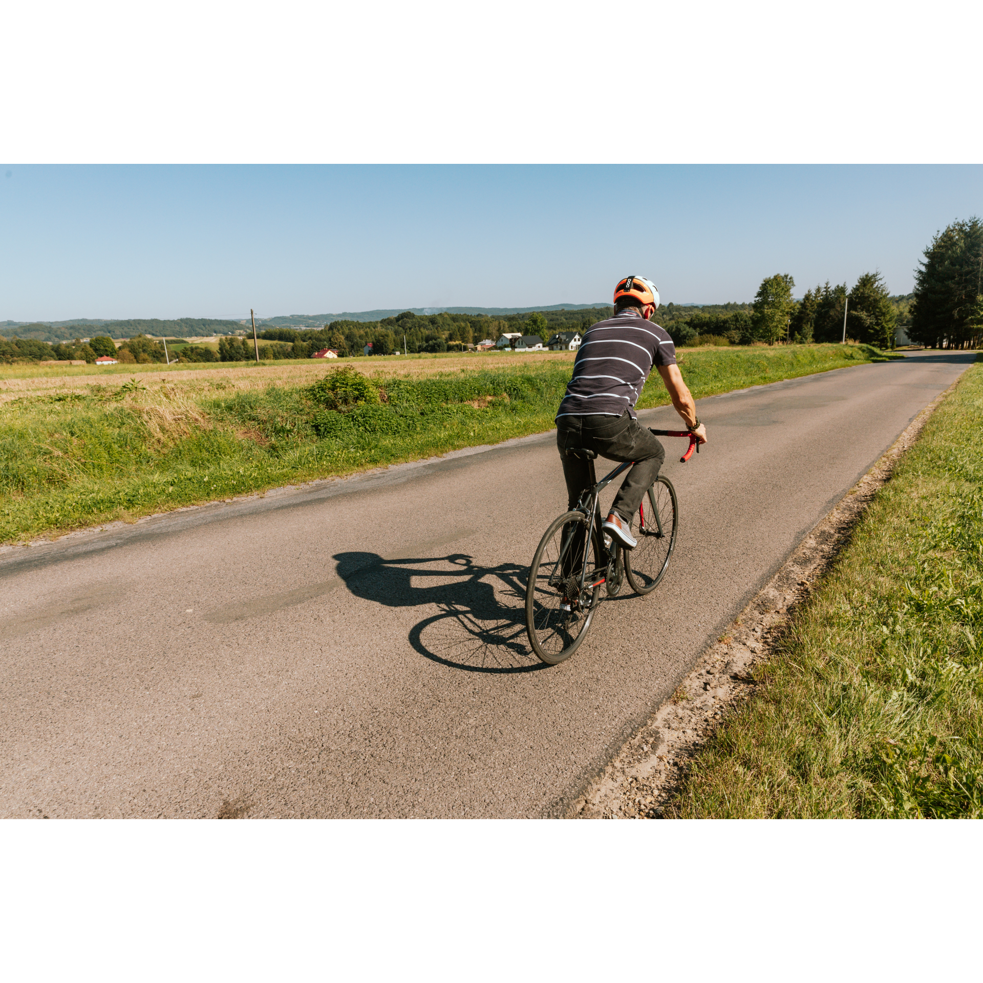 Cyclist on asphalt road