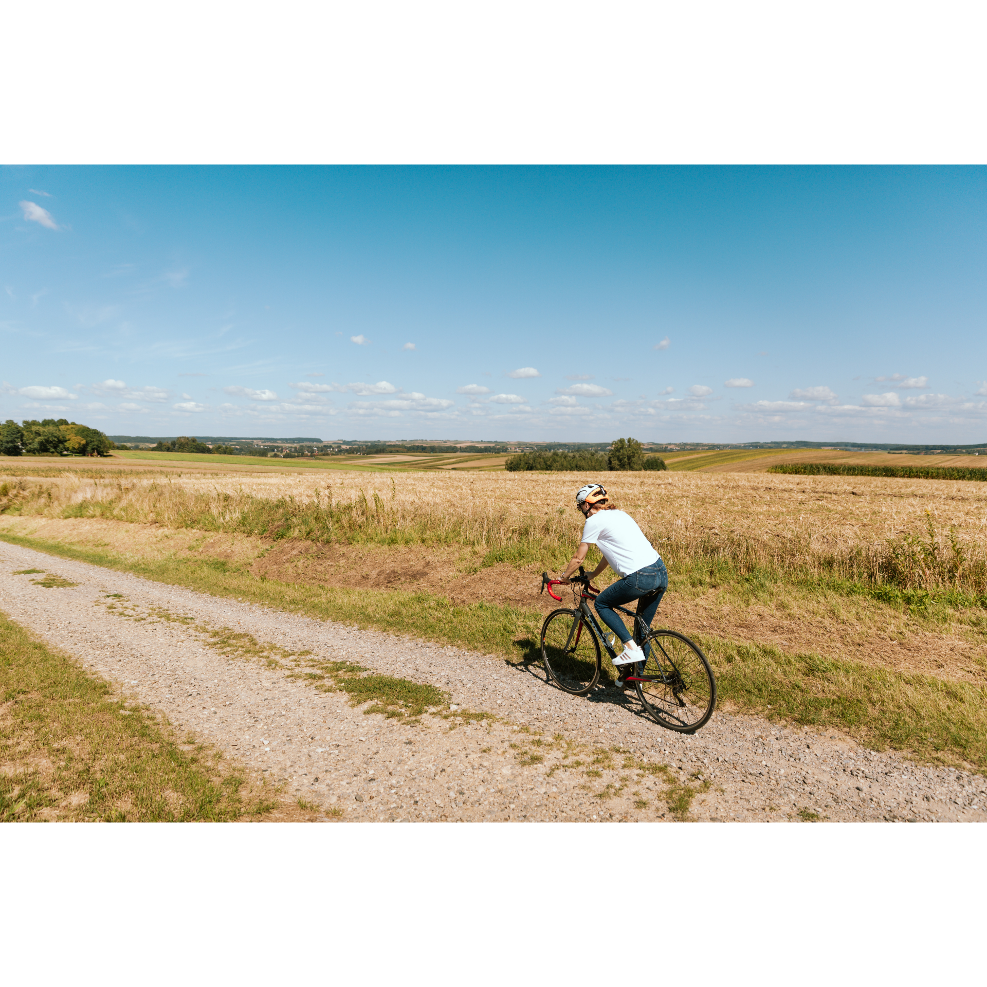 A cyclist on a dirt road