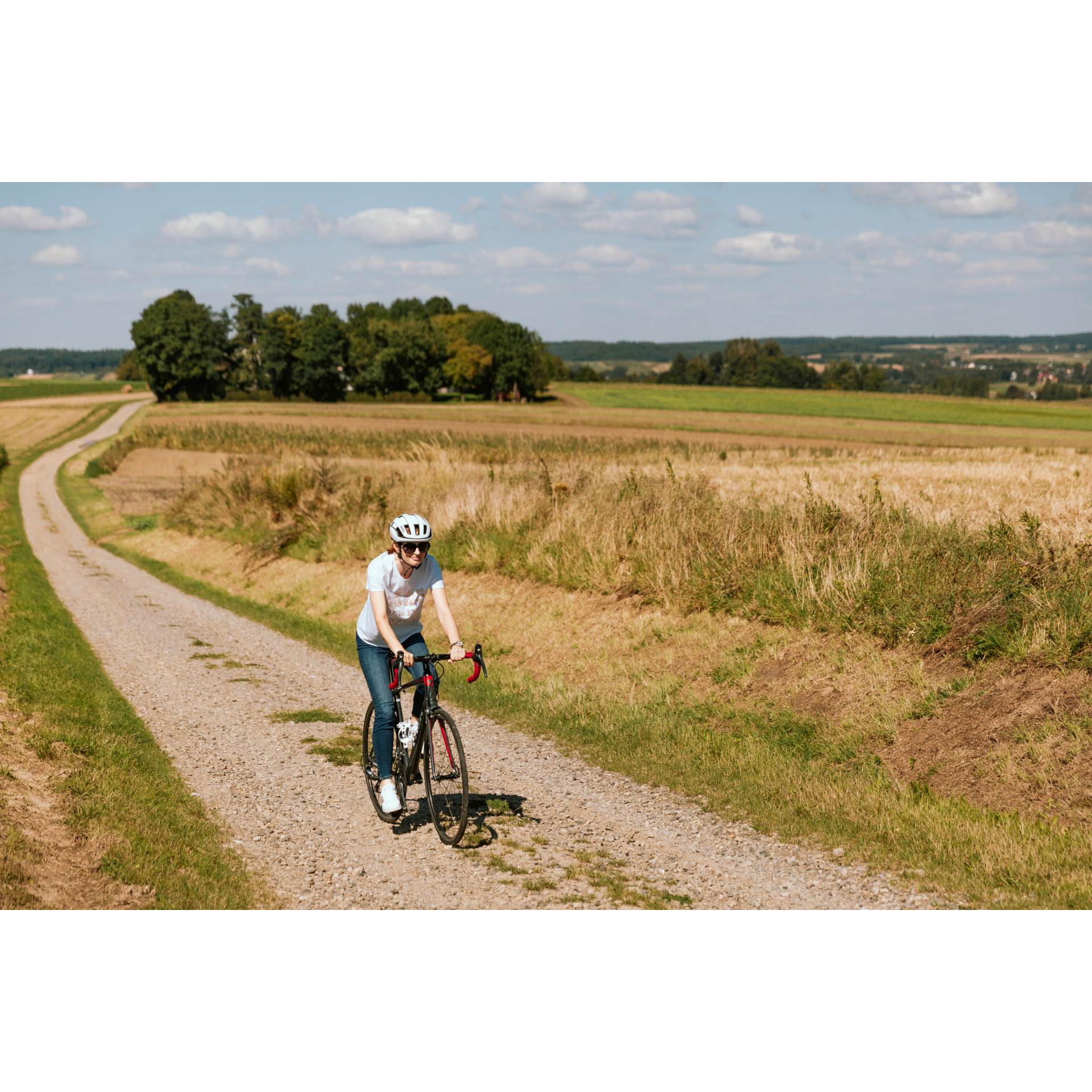 Cyclist on a gravel road