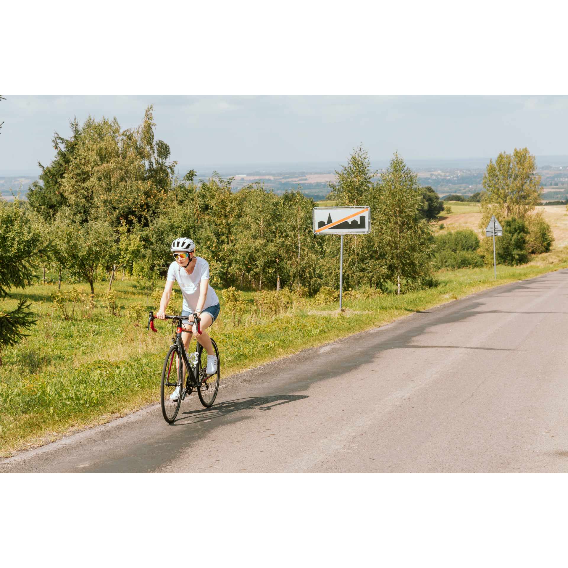 Cyclist and sign