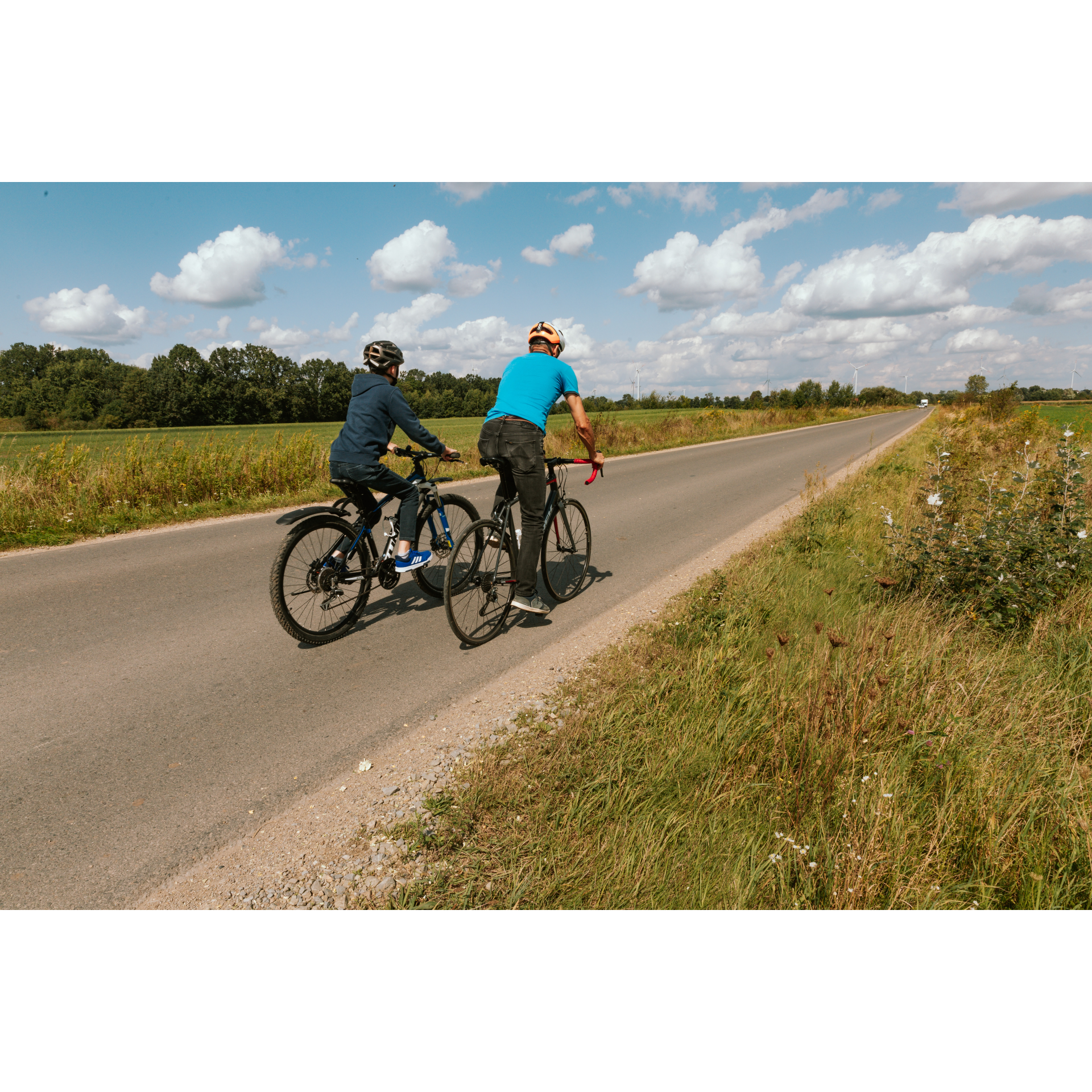 Cyclists on the asphalt road